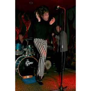 Magic Christian (L to R). Prairie Prince (Drums), Paul Kopf (Vocals), Alec Palao (bass)