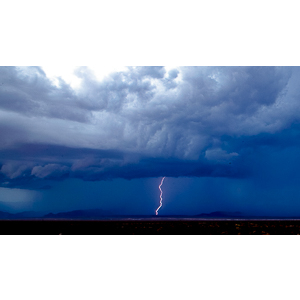 We had just left the Valley Of Fire in Southern Nevada and in the distance we saw a thunderstorm building.  It was time to try and capture some lightning.  I had read about how to do it and using those techniques, I got what I had been after for a long time, great shots of lightning bolts.